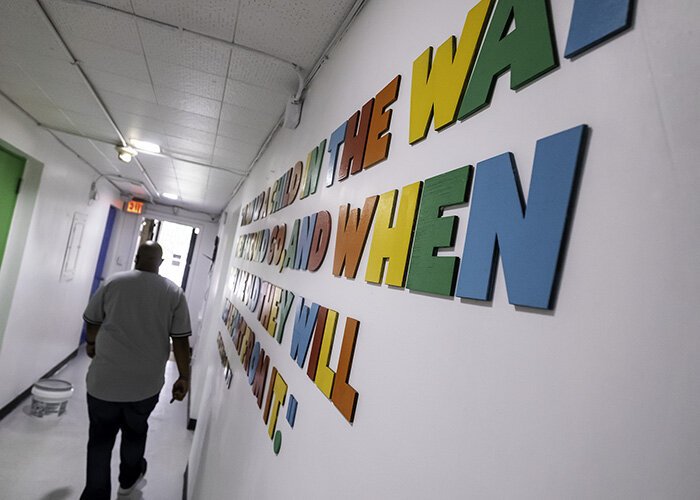 Matt Jones, who owns King's Kid Christian Daycare in Detroit, walks through the day care center ahead of its opening Wednesday, July 17, 2024.