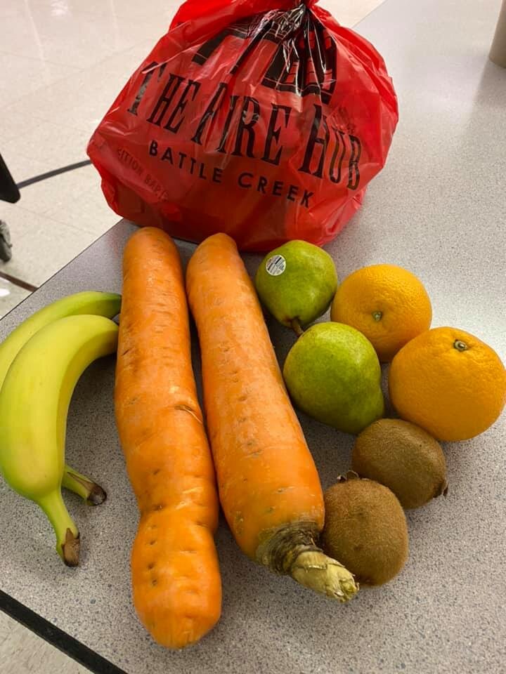 One of the "red bags" of produce that are sent home with PABS students.