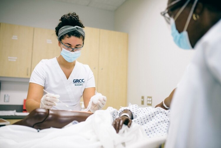 A nursing student in training at GRCC.