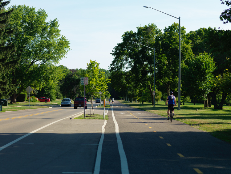 Bike lanes encourage people to use bicycles for commuting, saving money on car ownership. 