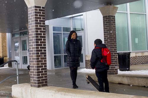 Johana Rodriguez shares a moment with a student at Burton Elementary and Middle School. 