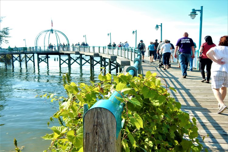 People spend time at Heritage Landing during the Michigan Irish Music Festival in September. Photo by Anna Gustafson