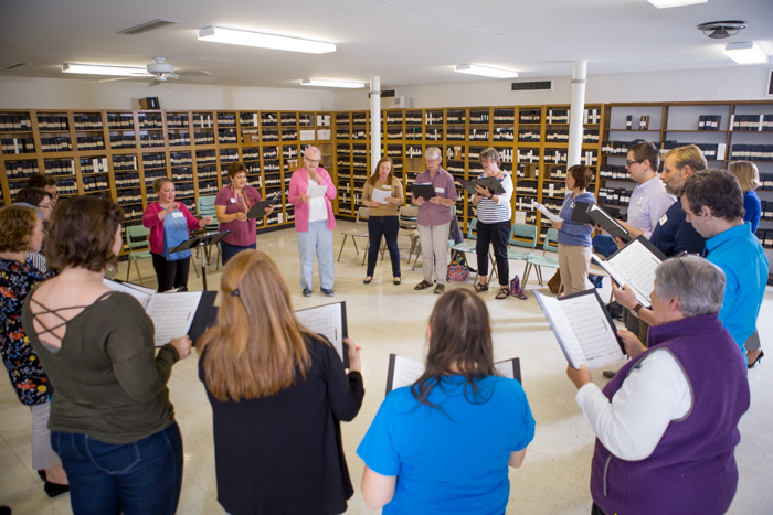 Minnis joins many others for rehearsal with the social justice choir. 