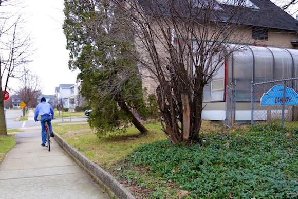 Herman Lee riding his bike in the southeast neighborhood of Grand Rapids