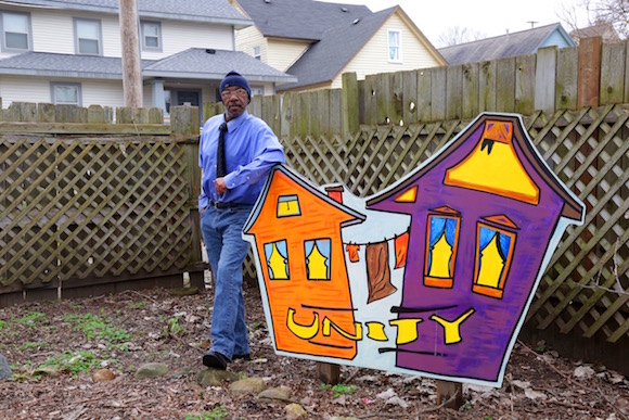 Herman Lee stands outside of Well House