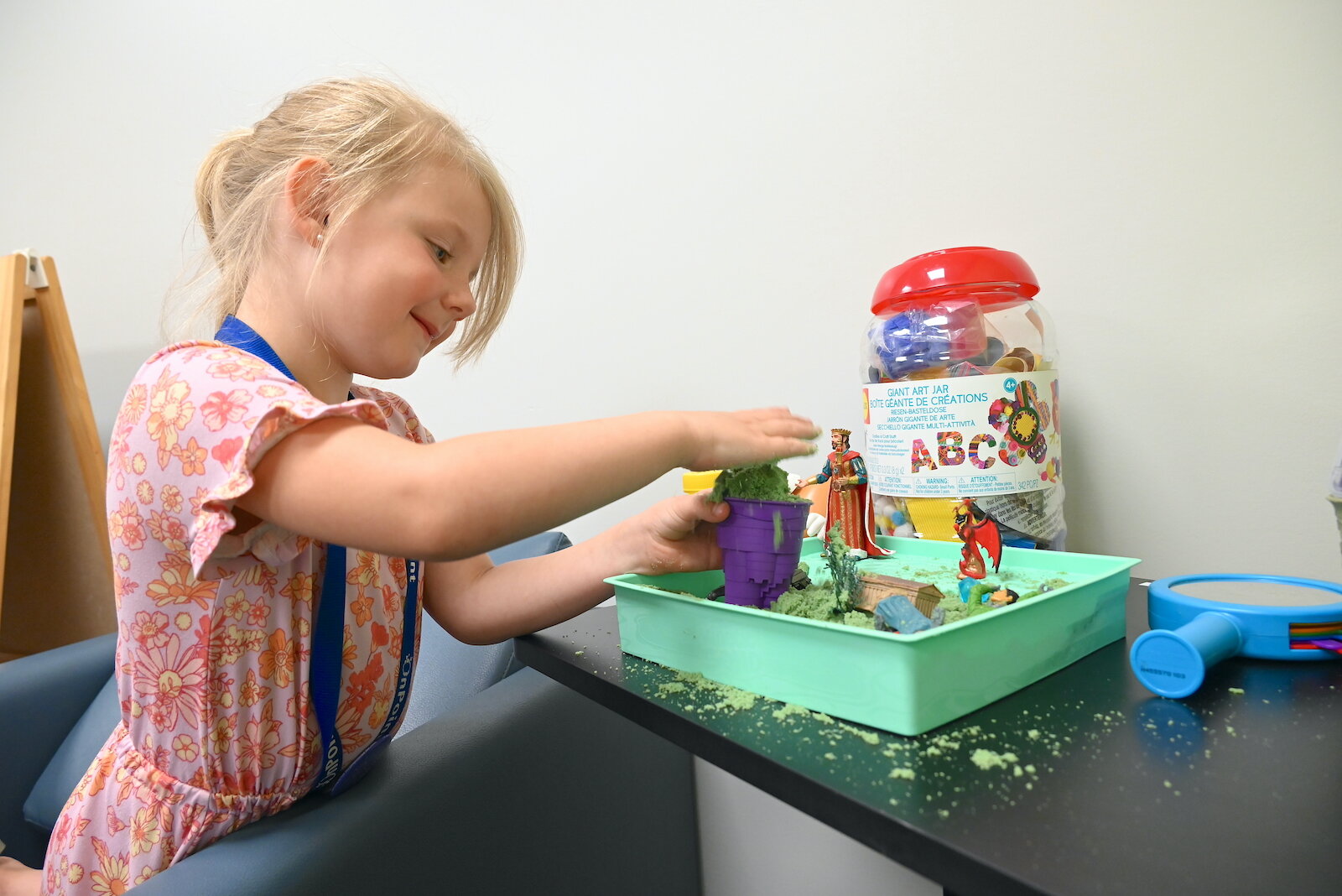 Alice plays in a room designed for children in OnPoint.