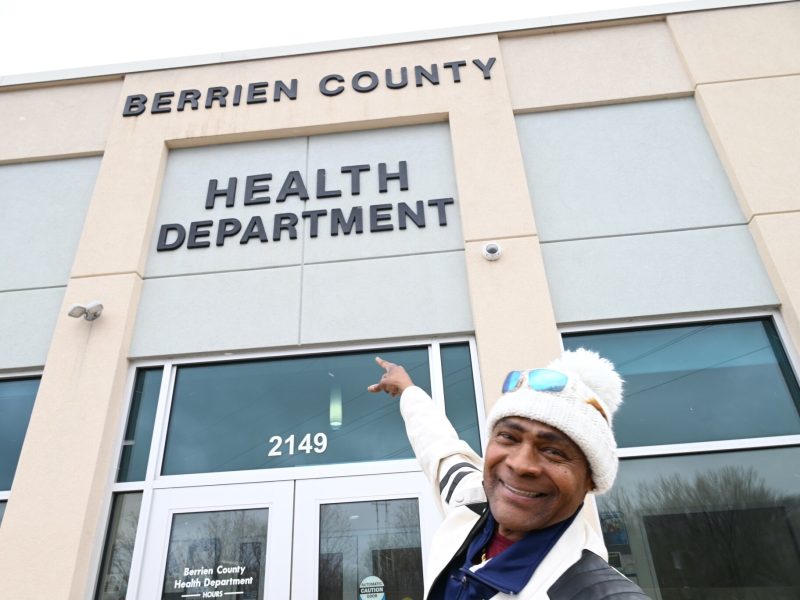 John Fuse, Community Health Worker with the Berrien County Health Department, stands outside the department’s building in Benton Harbor.