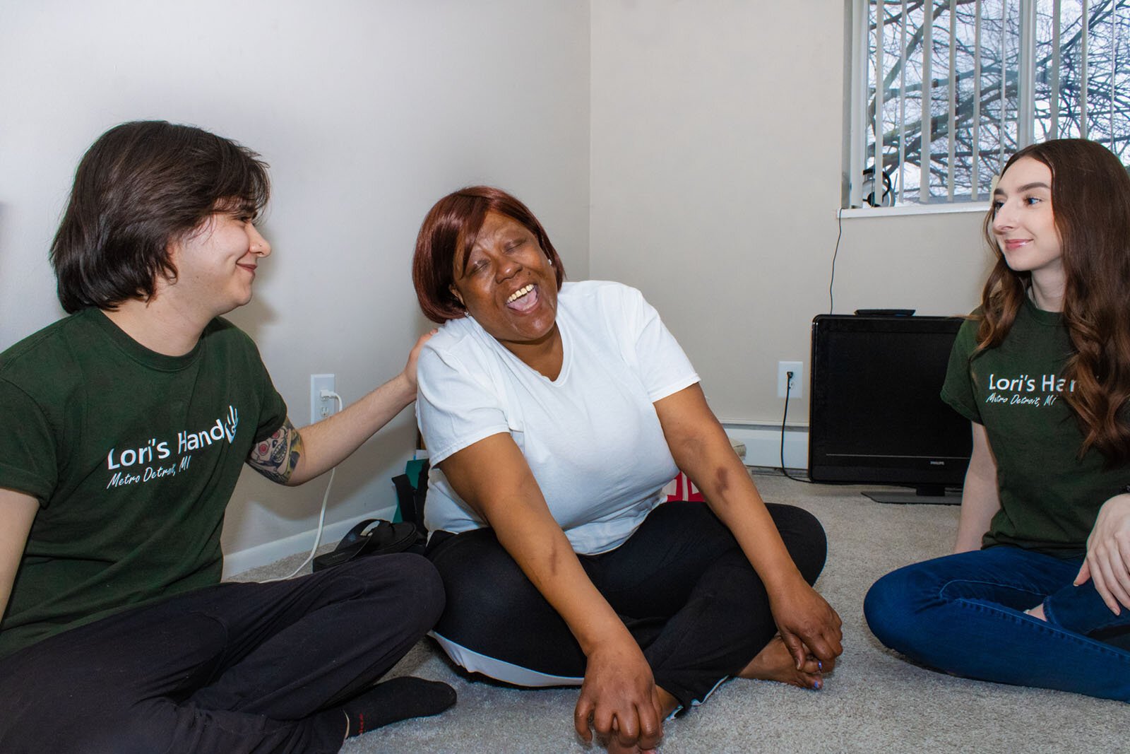 SOCIAL Program volunteers Keen Parra and Brooklynn Wilton with their client, Tammirah, at center.