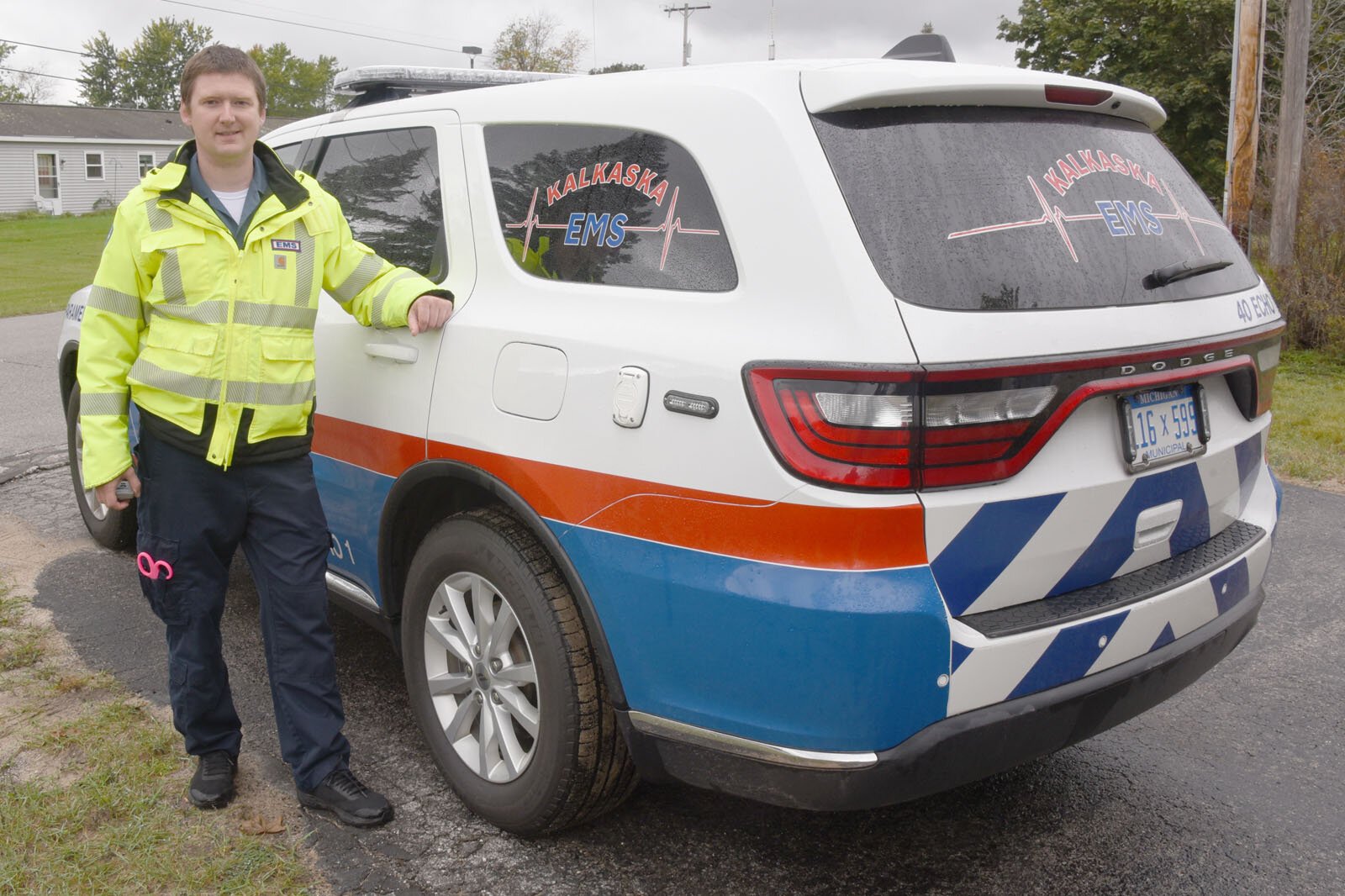 Mike Berendsohn, EMS director at Kalkaska Memorial Health Center, with a smaller vehicle often used for community paramedicine work.