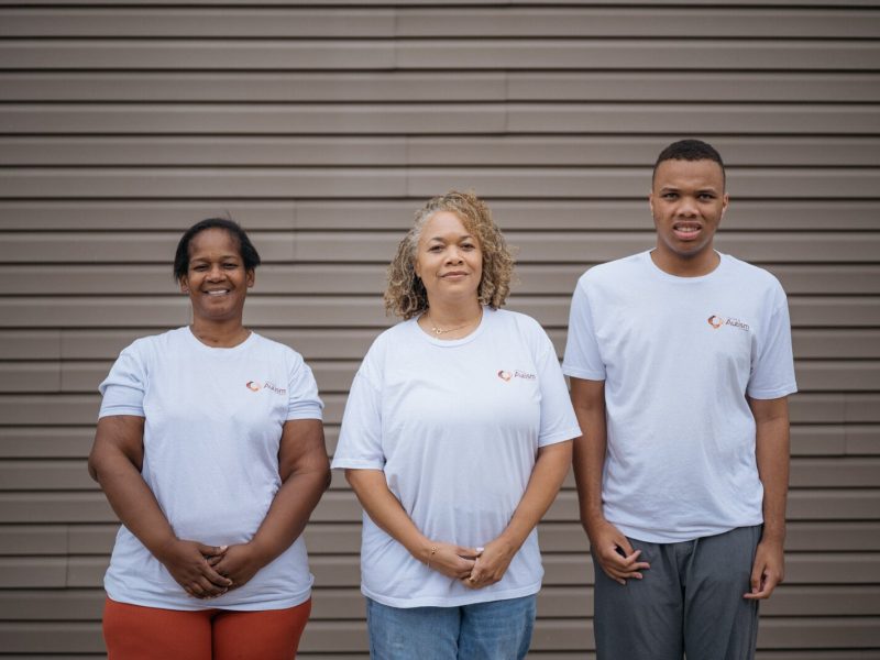 Color of Autism Foundation parent advocate Tanisha Burton, Color of Autism Foundation Executive Director Camille Proctor, and Proctor's son Ari Proctor.