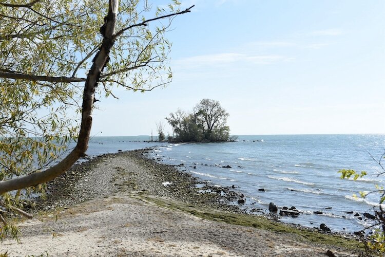 Visible at Scheeff East Point Preserve on South Bass Island is the small Buckeye Island or Buckeye Point, which used to be seasonally populated in the early 20th Century.