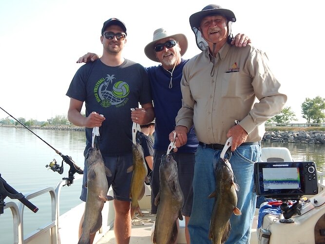 Capt. Jeff Tipple of Jig-N-Pig Guide Service with Andy Hageman (left) of Toledo and Jerry Bambauer, (right) of New Bremen. 