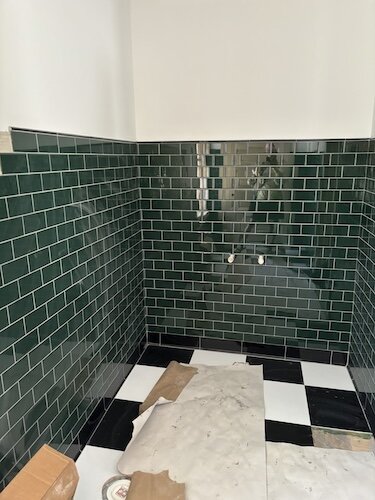 A bathroom is in the construction phase at Lonz Mansion.