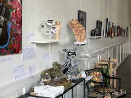 Art from the traveling exhibit is on display until July 20.