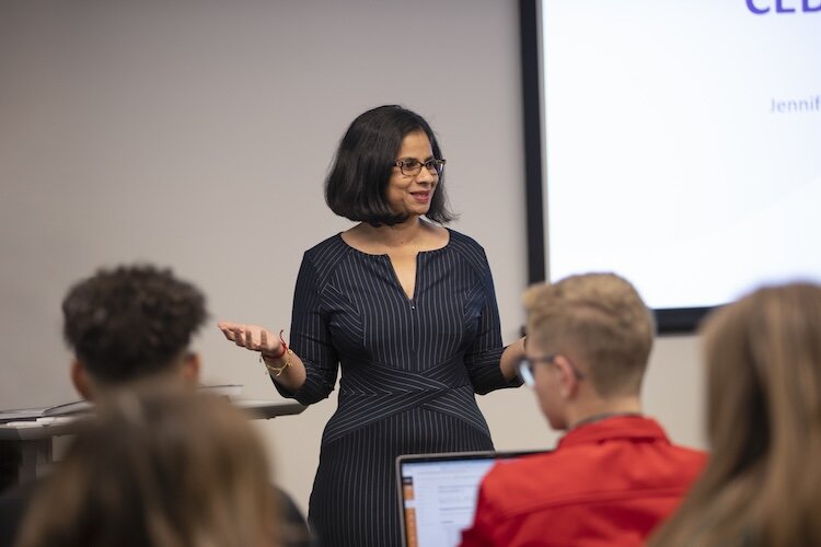 Dr. Swathi Ravichandran leads a class at the Cedar Fair Resort Attraction and Management building in Sandusky.