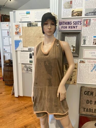 A Gem Beach display features a unisex swimsuit that visitors could rent. (Photo/Kristina Smith)