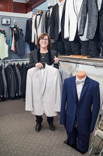 McKillips shows off some of the wares at Tux World.