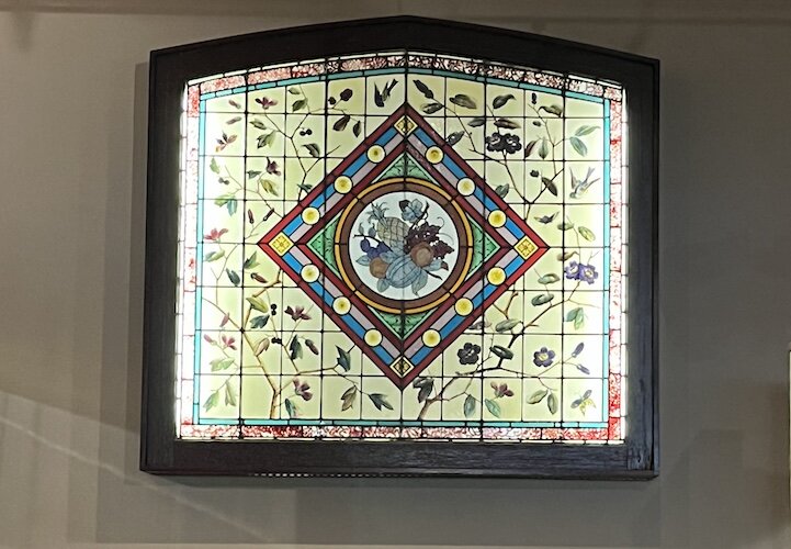 Wall installed this stained glass fixture to add to the overall aesthetic at Berry's.