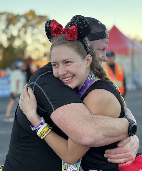 Adrienne and Dan celebrate after the Disney Half Marathon. (Photo/Courtesy of Dan Grieb)