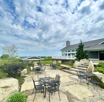 Visitors can enjoy a glass of wine on Quarry Hill's patio. (Photo/Courtesy of Quarry Hill)