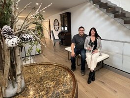 Jen and Ed Torres live across the street from their new project. (Photo/The Helm)