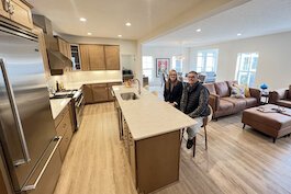 Paula and Tom Collier in the ktichen of the Market Street home.