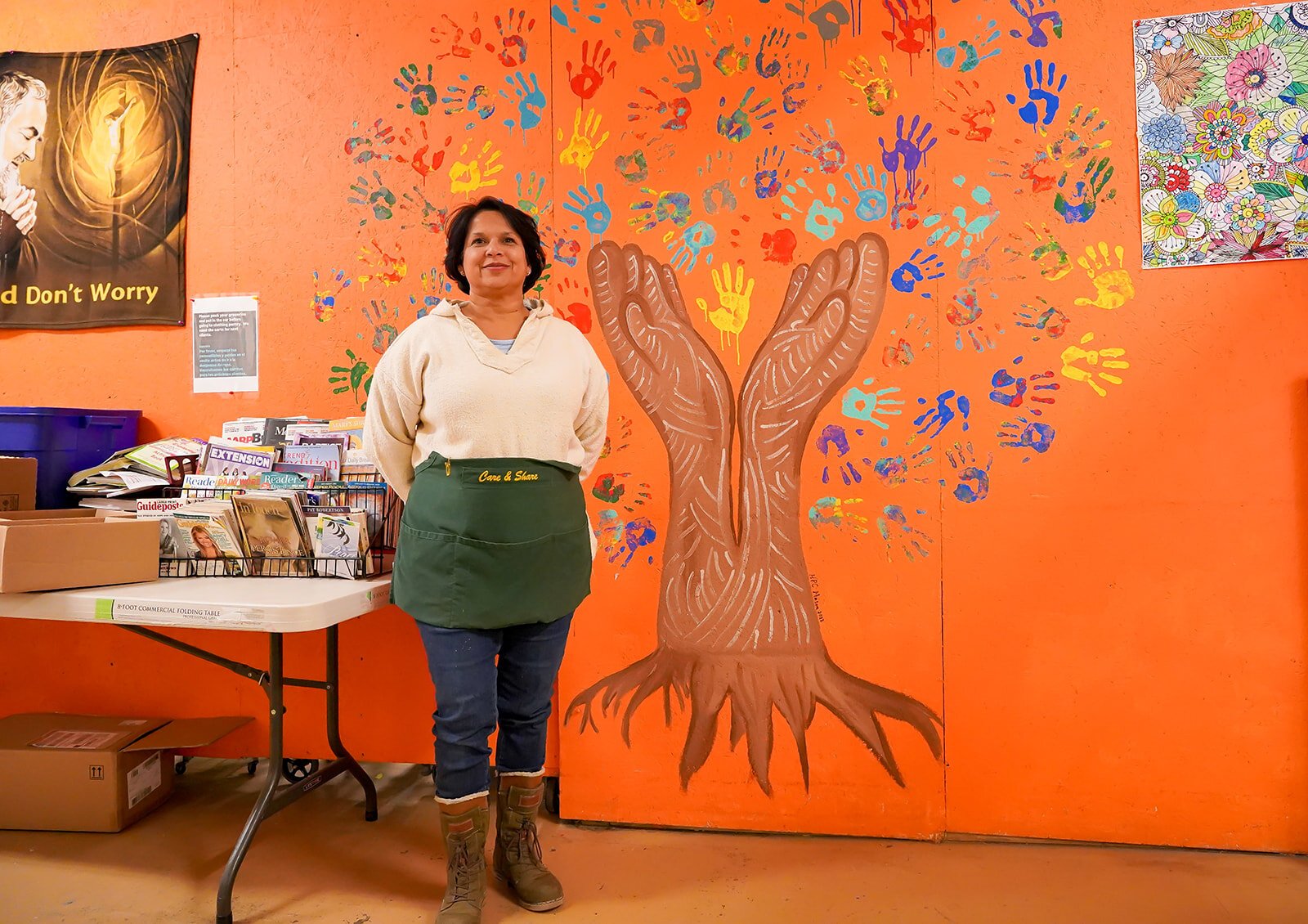 Anita Kromer stands inside the Care & Share office on Jackson Street.