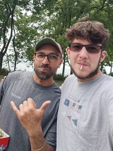 Pramod Abichandani and Cody Kowalski receive the Dum-Dum lollipops delivery on Put-in-Bay.