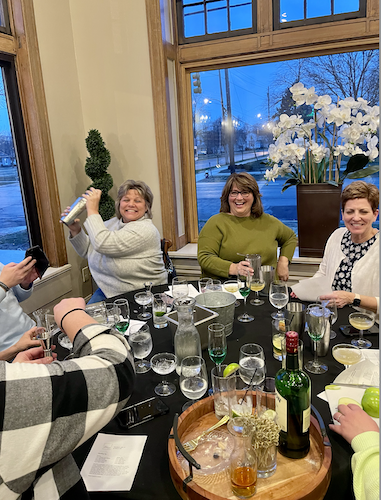 Guests learn to properly shake cocktails at a Venue 634 cocktail class.