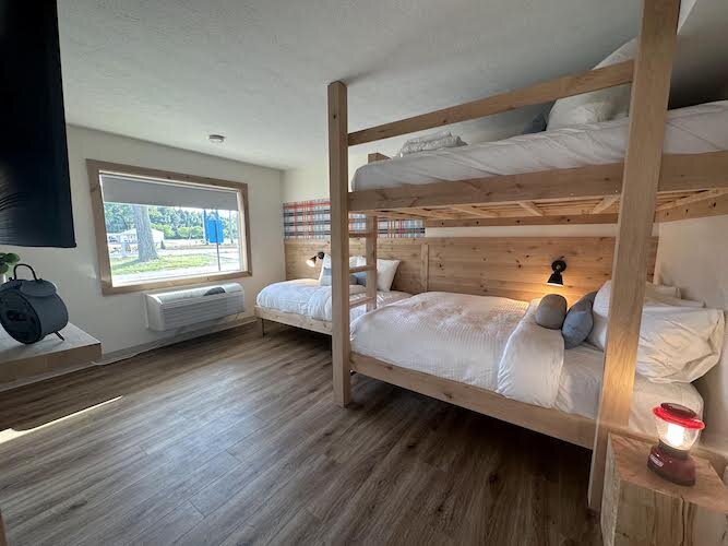One of the 25 units features handcrafted knotty alder wood beds and bunkbeds. (Photo/Courtesy of Justin Brady)