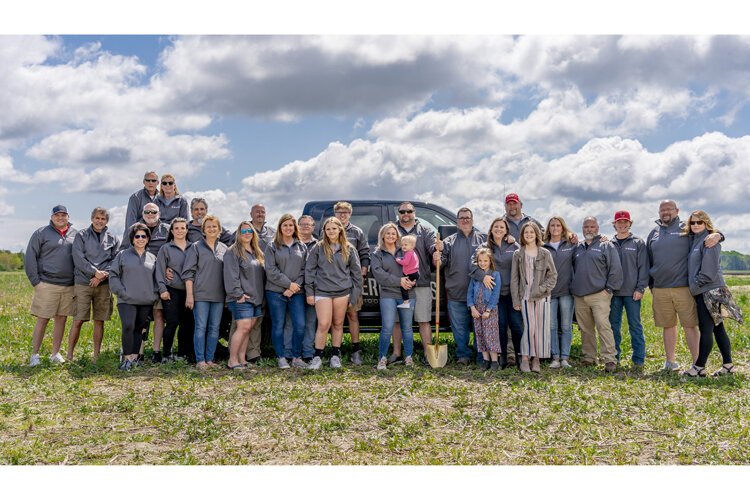 Investors and their families attend the groundbreaking ceremony in March 2022.