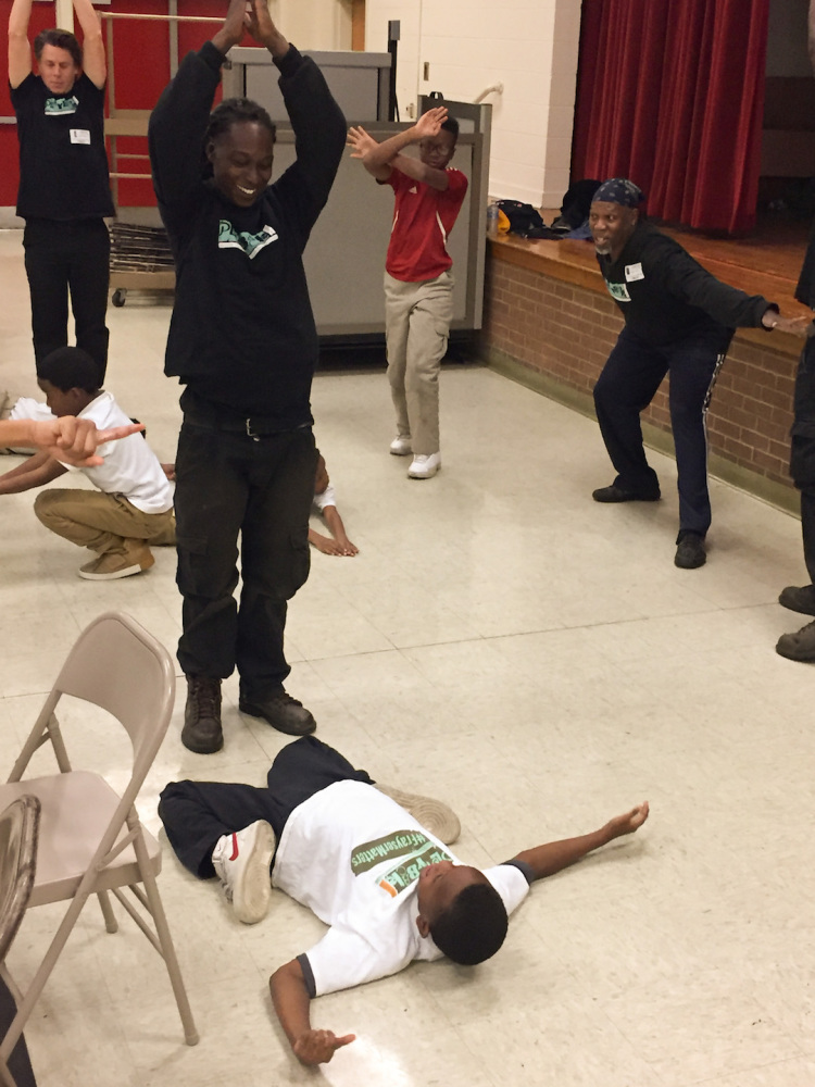 Gabrielle Cole and her partner, Louis, 10, make contrasting shapes with their bodies as part of a series of movement exercises. (Cole Bradley)