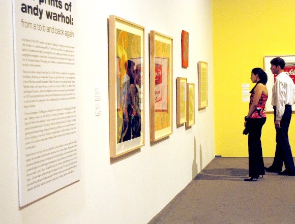 Visitors enjoy a traveling exhibit at the Brooks Museum.