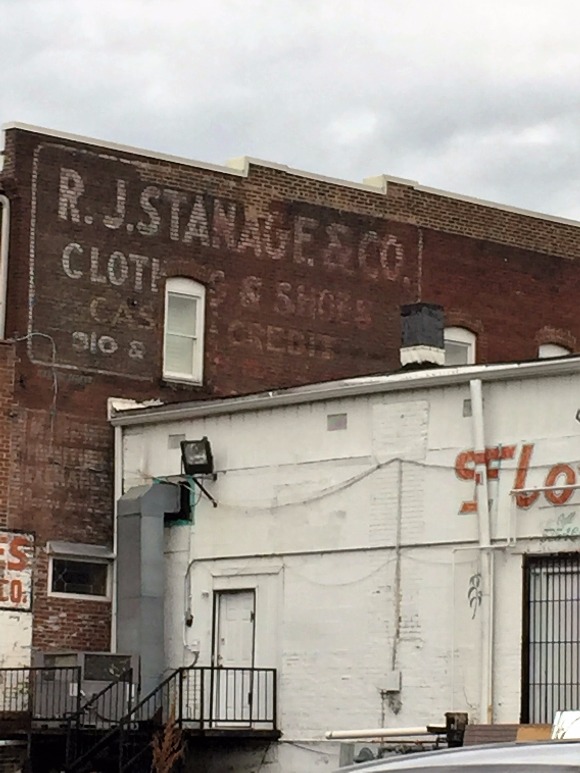A ghost sign from the turn of the century hangs on to the side of South Main.