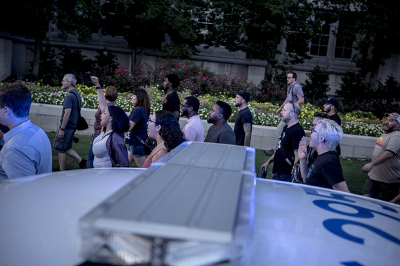 Police presence surrounded the peaceful gathering of community members at Health Sciences Park.