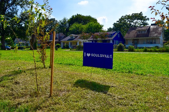 A sign outside of the Snowden House promotes neighborhood love.