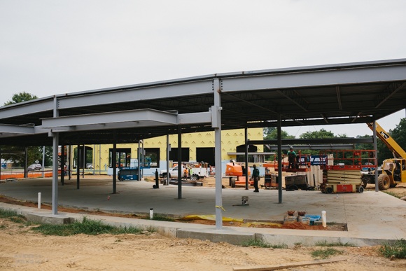 Framing of a building is erected as part of the Binghampton Gateway.