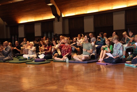 Practitioners are led in a breathing exercise at the 2017 Rhodes Day of Mindfulness.