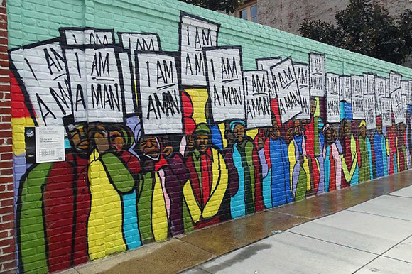 The "I'm a Man" mural was designed by rap artist Marcellous Lovelace in a modern graffiti style and installed by BLK75. It can be found on S. Main Street, close to the National Civil Rights Museum. 