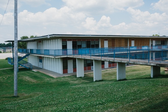 Georgia Avenue Elementary sits partially boarded up and vacant across the street from Booker T. Washington High School.
