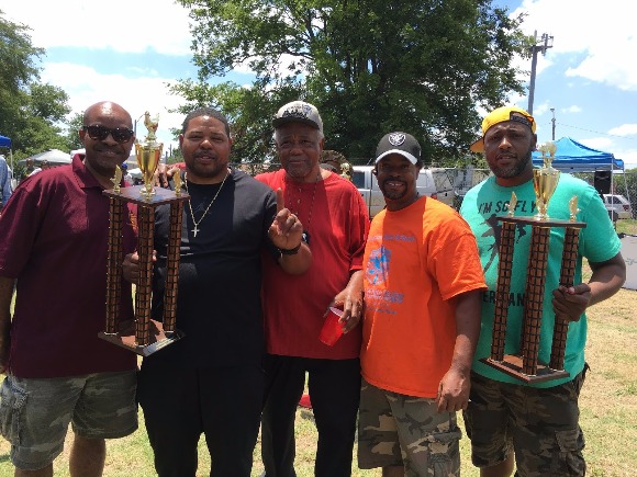 Greater White Stone's All-Star Pit Masters accepting their trophy next to their pastor Roger Brown, pictured left.