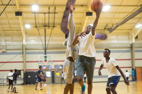 Students play basketball at Streets Ministries' facility at 430 Vance Avenue.
