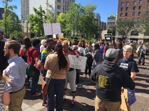 Protestors outside Memphis City Hall decry a visit from Attorney General Jeff Sessions.