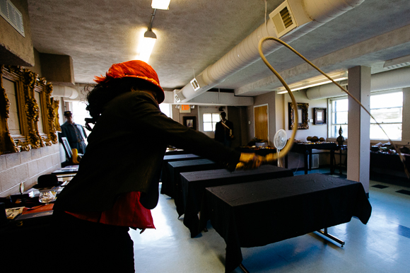 Dr. Carnita Atwater demonstrates using a whip at the New Chicago Community Development Corp.