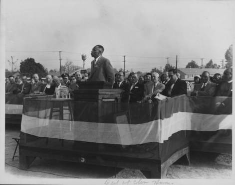 George W. Lee is pictured at the podium, speaking at the 1955 dedication ceremony of the Cleaborn Homes in Memphis, TN.