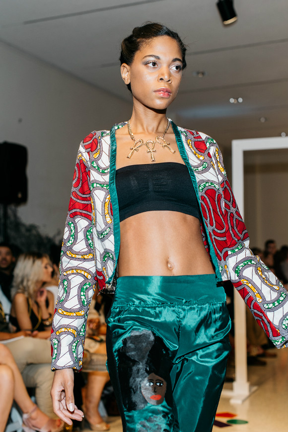 A model shows the designs of local artist Jennifer Williams at Memphis Fahsion Week.