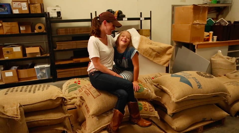Diane Grover with her daughter MaryEllen and Dreamers coffee beans.