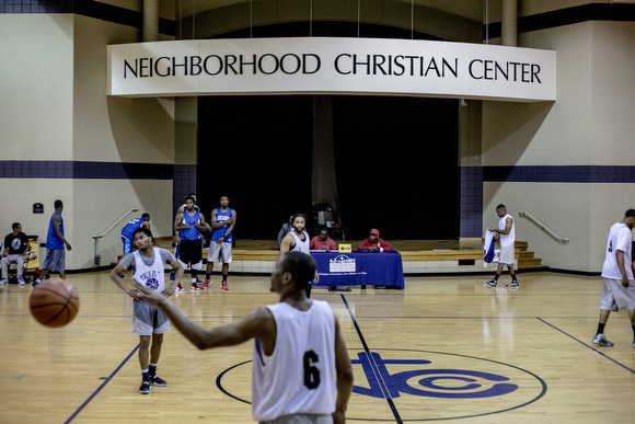 A game between the West Memphis Ballers (blue) and the Neighborhood Christian Center teams.