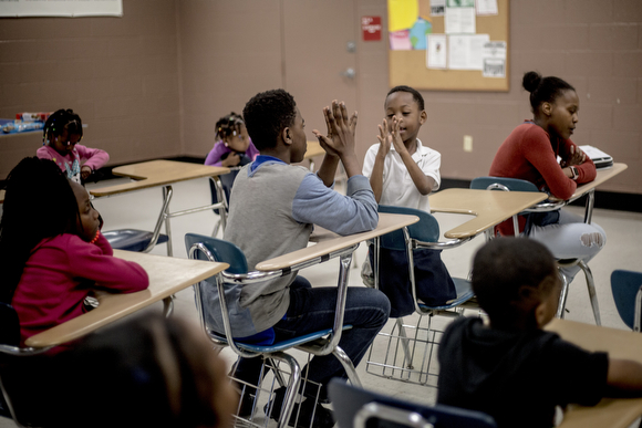 Kids play a game during a meet-and-greet for the North Memphis Steelers peewee football team at the Dave Wells Community Center in Smokey City.