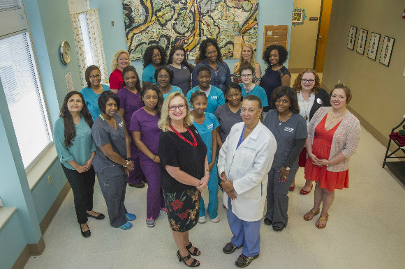 The staff of CHOICES at the existing facility at 1726 Poplar Ave.